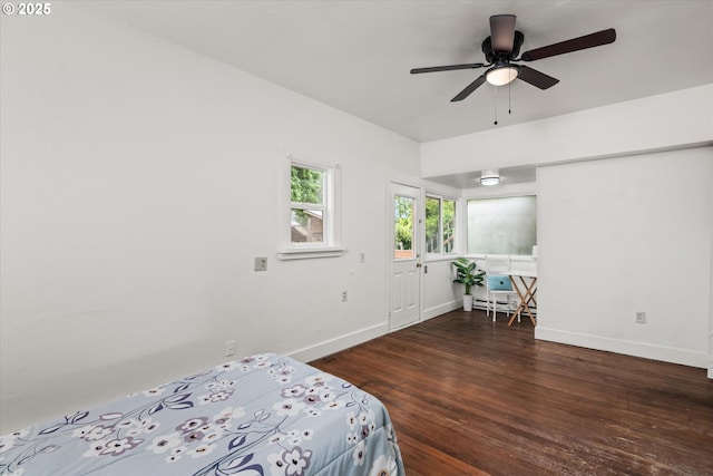 561 Madison St, Eugene, OR 97402 - bedroom featuring wood finished floors, baseboards, and baseboard heating
