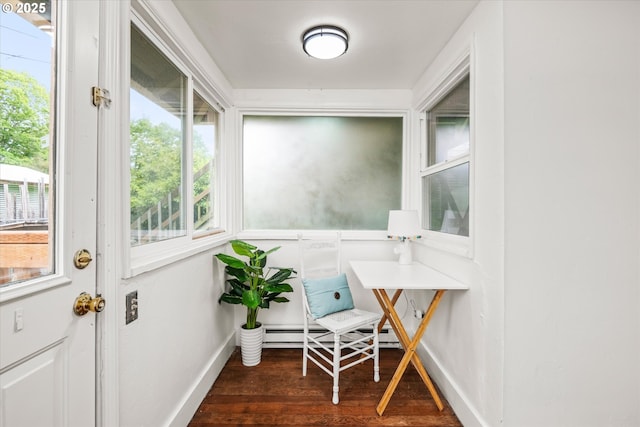 561 Madison St, Eugene, OR 97402 - sunroom with healthy amount of natural light and a baseboard heating unit