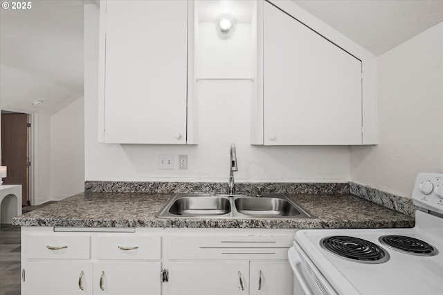 561 Madison St, Eugene, OR 97402 - kitchen with white range with electric stovetop, a sink, dark countertops, lofted ceiling, and white cabinets