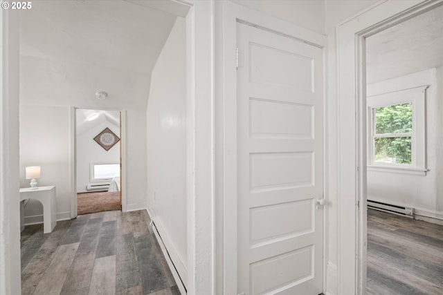 561 Madison St, Eugene, OR 97402 - corridor featuring baseboard heating, wood finished floors, a baseboard radiator, and lofted ceiling