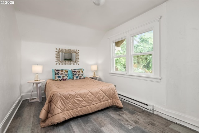 561 Madison St, Eugene, OR 97402 - bedroom with baseboard heating, vaulted ceiling, wood finished floors, and baseboards