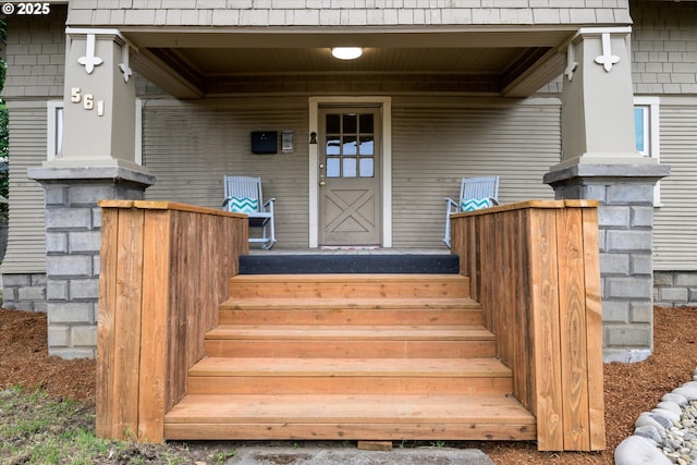 561 Madison St, Eugene, OR 97402 - property entrance featuring a porch