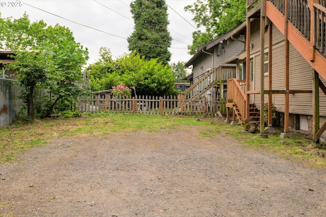 561 Madison St, Eugene, OR 97402 - view of yard featuring stairs and a deck