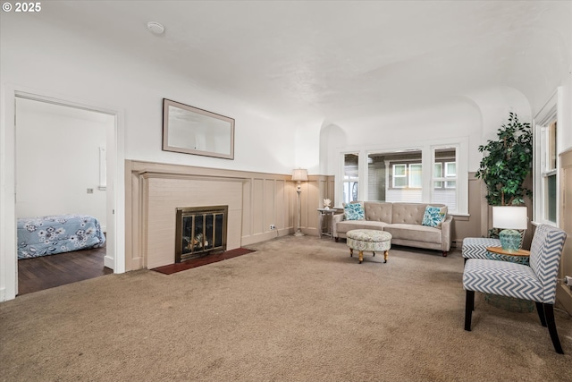 561 Madison St, Eugene, OR 97402 - carpeted living area featuring a fireplace with flush hearth