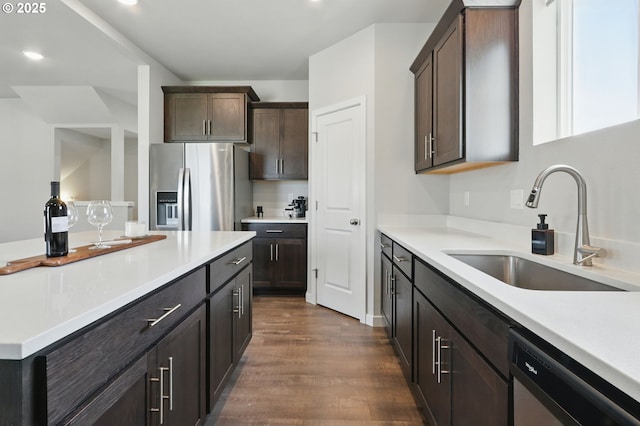 4236 E Willakenzie St, Newberg, OR 97132 - kitchen featuring stainless steel appliances, dark wood-style floors, light countertops, dark brown cabinets, and recessed lighting