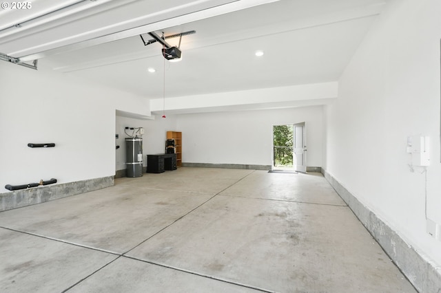 4236 E Willakenzie St, Newberg, OR 97132 - garage with water heater, a garage door opener, and recessed lighting