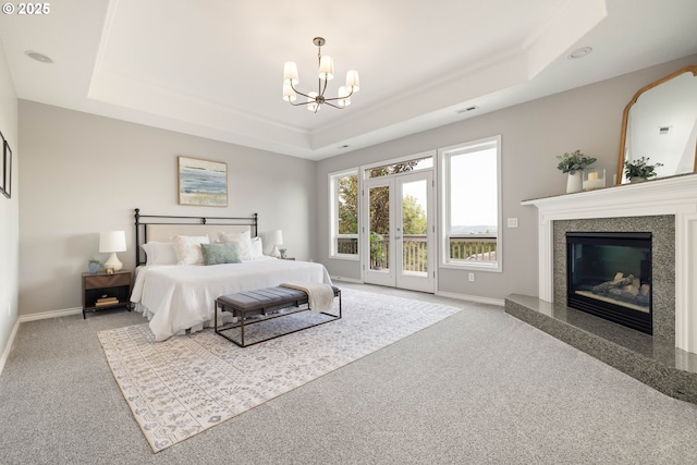 10695 SW Meier Dr, Tualatin, OR 97062 - bedroom with a tray ceiling, carpet, and a chandelier