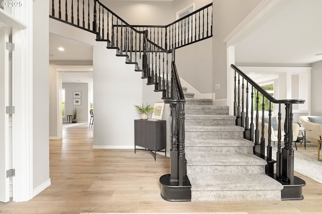 10695 SW Meier Dr, Tualatin, OR 97062 - stairs with wood finished floors, healthy amount of natural light, and a high ceiling