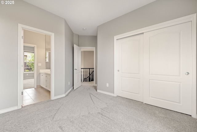 10695 SW Meier Dr, Tualatin, OR 97062 - unfurnished bedroom with light colored carpet, a closet, and connected bathroom