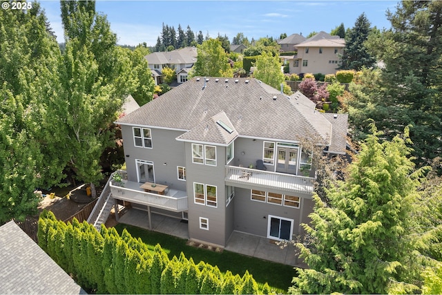 10695 SW Meier Dr, Tualatin, OR 97062 - back of property with a wooden deck and stairway