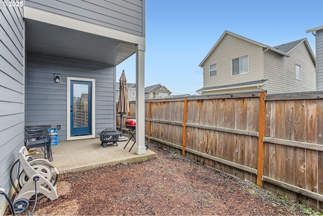1319 S 29th Blvd, Cornelius, OR 97113 - fenced yard with an outdoor fire pit and a patio