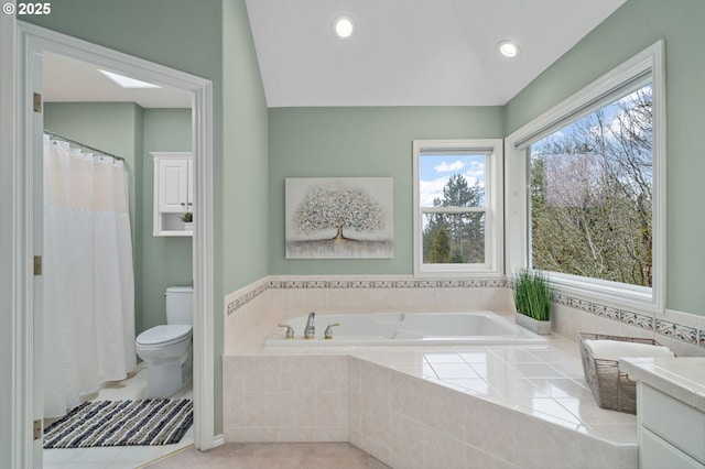 bathroom featuring toilet, vaulted ceiling, recessed lighting, a bath, and vanity