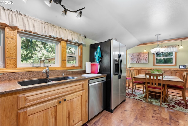 25465 S Beavercreek Rd, Beavercreek, OR 97004 - kitchen with stainless steel appliances, a sink, plenty of natural light, lofted ceiling, and light wood finished floors