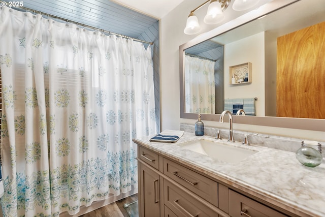25465 S Beavercreek Rd, Beavercreek, OR 97004 - bathroom with vanity, a shower with curtain, and wood finished floors