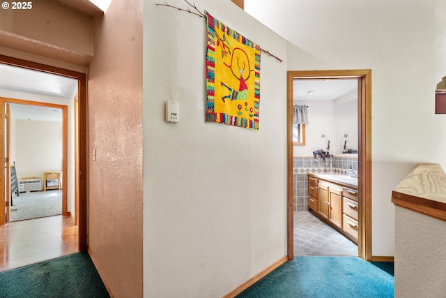 25465 S Beavercreek Rd, Beavercreek, OR 97004 - hall with carpet floors, baseboards, and a sink