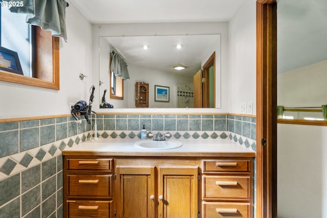 25465 S Beavercreek Rd, Beavercreek, OR 97004 - bathroom with tile walls, vanity, and wainscoting