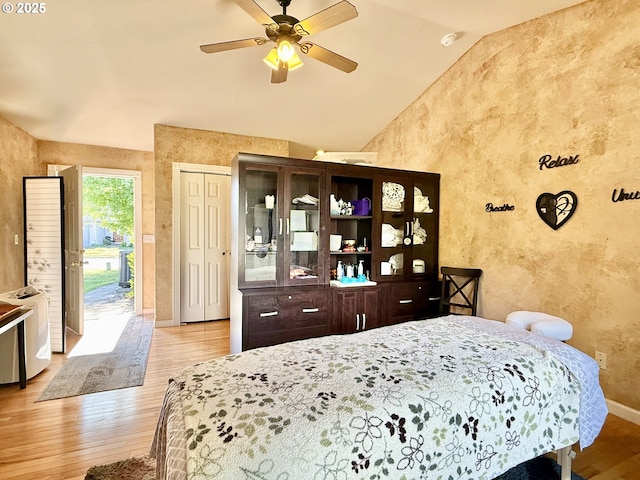 2942 NW Watkins Ct, Camas, WA 98607 - bedroom with wood finished floors, a textured wall, vaulted ceiling, and ceiling fan