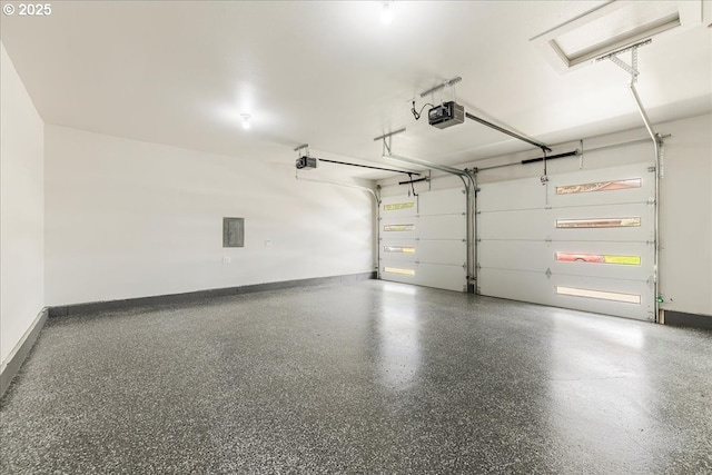 garage with baseboards, a garage door opener, and electric panel