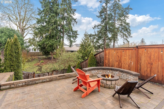 view of patio featuring a fire pit