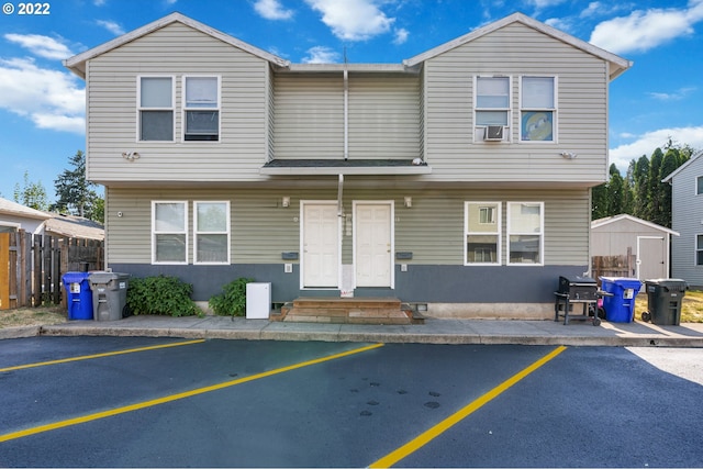 view of front of property with cooling unit