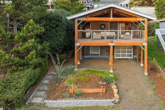 view of front of property featuring an attached garage and driveway