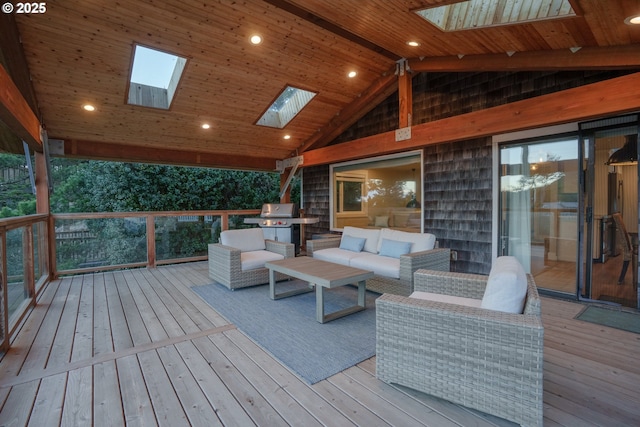 deck featuring grilling area and an outdoor hangout area