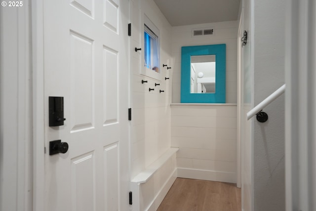 mudroom featuring visible vents and light wood-style floors