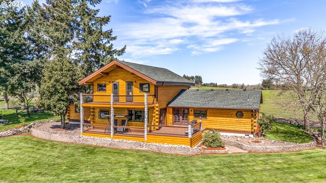 95787 Territorial Hwy, Monroe, OR 97456 - rear view of property with log siding, a yard, a deck, a balcony, and french doors