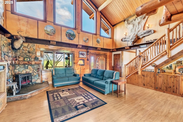 95787 Territorial Hwy, Monroe, OR 97456 - living room featuring high vaulted ceiling, stairs, beamed ceiling, wood ceiling, and wood finished floors