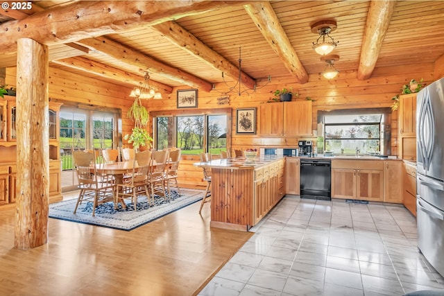 95787 Territorial Hwy, Monroe, OR 97456 - kitchen featuring dishwasher, plenty of natural light, wood ceiling, beam ceiling, and light brown cabinets