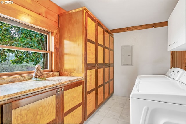 95787 Territorial Hwy, Monroe, OR 97456 - laundry room featuring cabinet space, separate washer and dryer, light marble finish floors, and electric panel