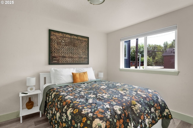 1733 Mill Aly, Eugene, OR 97401 - bedroom with baseboards and wood finished floors