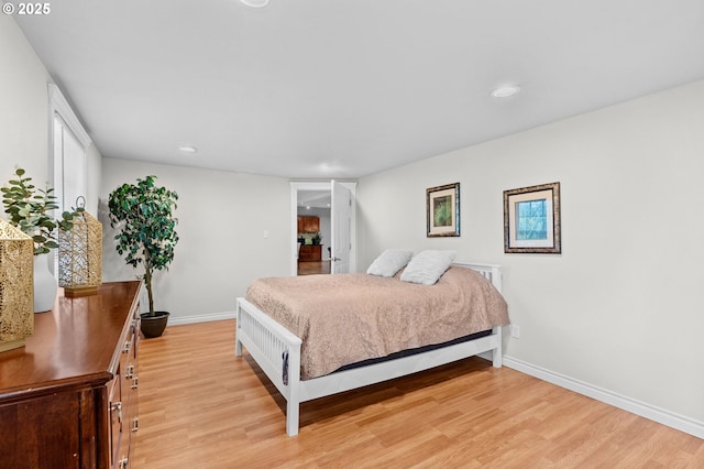 1000 S King St, Seaside, OR 97138 - bedroom featuring light wood finished floors, baseboards, and recessed lighting