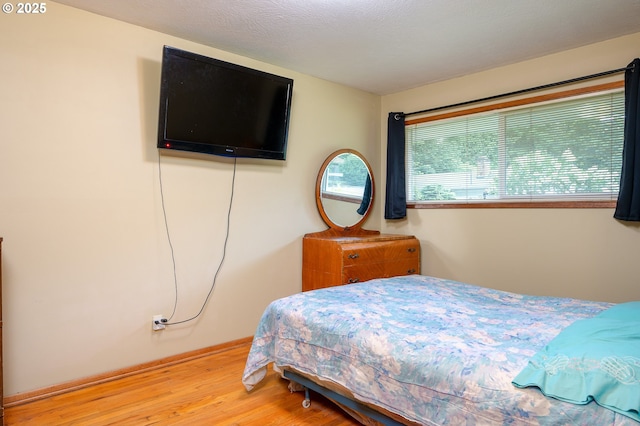 11102 SE 51st Ave, Milwaukie, OR 97222 - bedroom with light wood-type flooring and baseboards