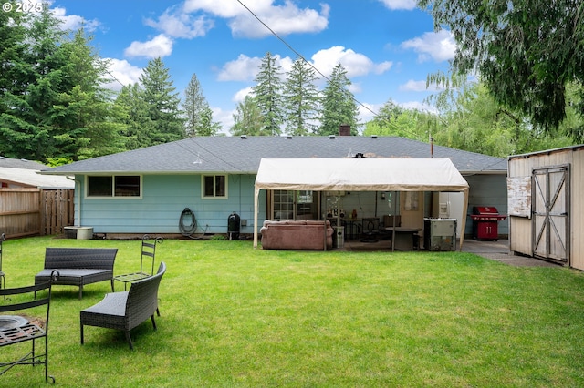 11102 SE 51st Ave, Milwaukie, OR 97222 - back of house featuring a storage shed, roof with shingles, an outdoor structure, a patio, and a chimney