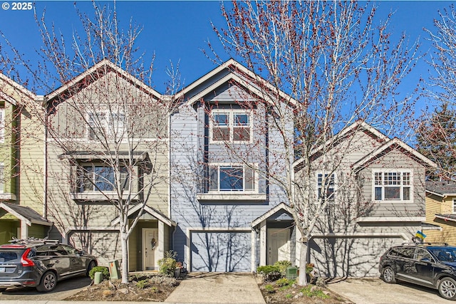 view of front of house featuring a garage and concrete driveway