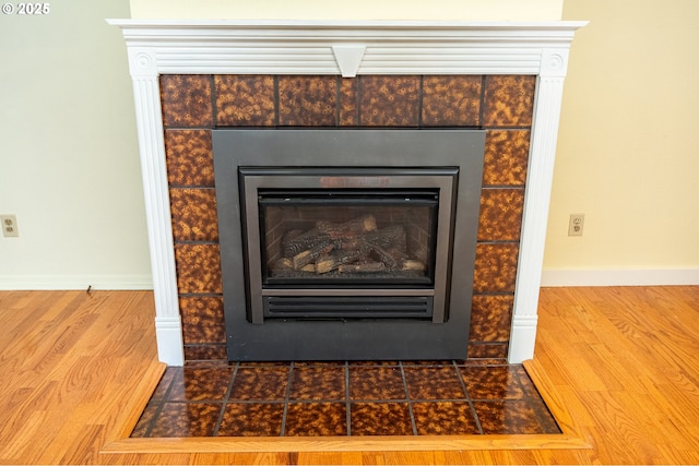 1444 Russet Dr, Eugene, OR 97401 - detailed view of a tile fireplace and wood finished floors