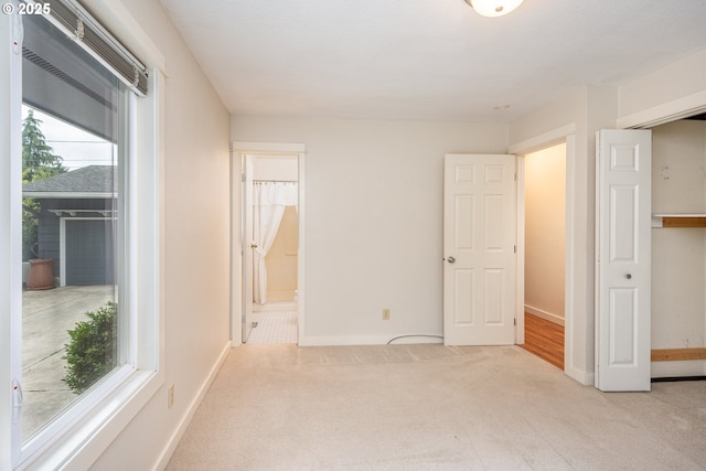 1444 Russet Dr, Eugene, OR 97401 - unfurnished bedroom featuring carpet flooring and ensuite bath