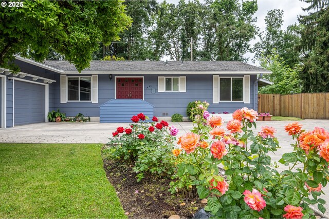 1444 Russet Dr, Eugene, OR 97401 - single story home featuring an attached garage, driveway, and roof with shingles