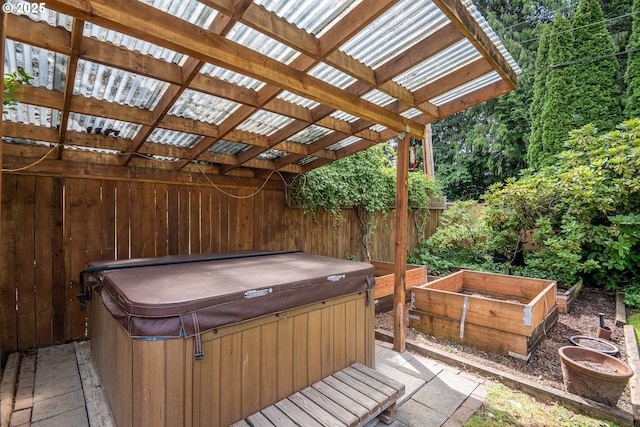 1444 Russet Dr, Eugene, OR 97401 - deck featuring a hot tub and a garden