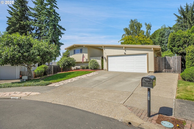 4420 NW 187th Ave, Portland, OR 97229 - view of front of house with driveway and an attached garage