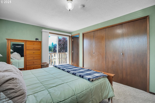 4420 NW 187th Ave, Portland, OR 97229 - bedroom featuring carpet floors, a textured ceiling, a closet, and access to outside
