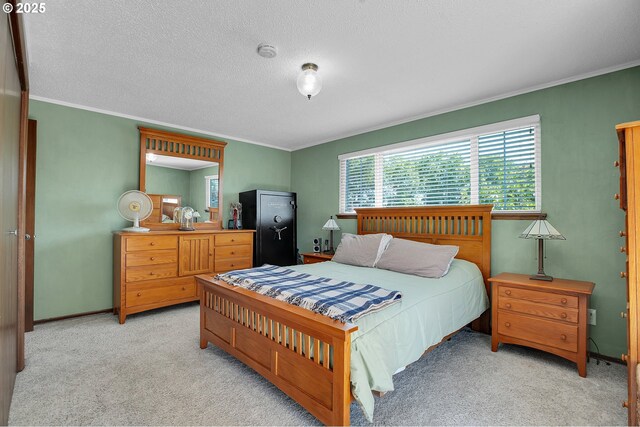 4420 NW 187th Ave, Portland, OR 97229 - bedroom featuring light carpet, ornamental molding, and a textured ceiling