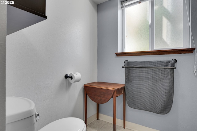 4420 NW 187th Ave, Portland, OR 97229 - bathroom featuring toilet and baseboards