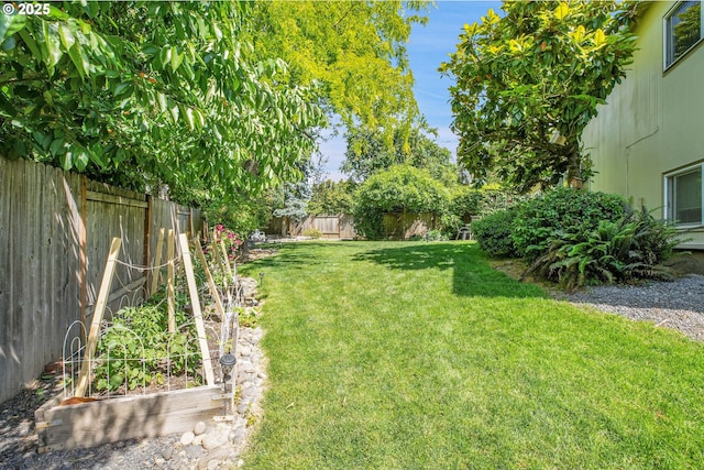 4420 NW 187th Ave, Portland, OR 97229 - fenced backyard featuring a garden