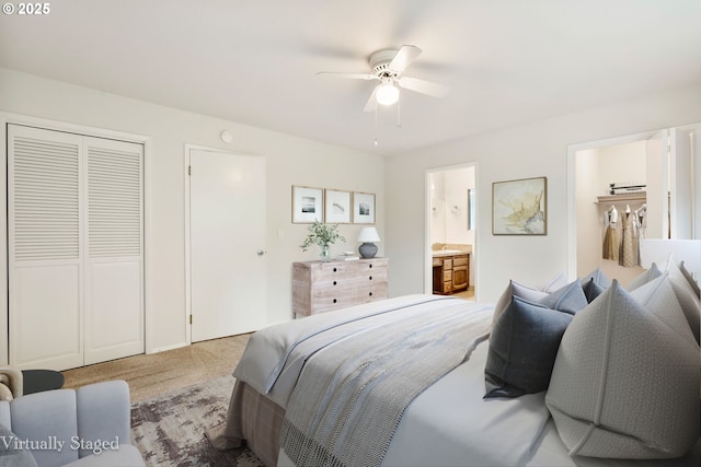 12370 SW 121st Ave, Tigard, OR 97223 - bedroom with carpet floors, a closet, connected bathroom, and ceiling fan