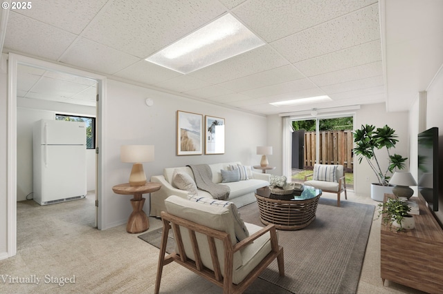 12370 SW 121st Ave, Tigard, OR 97223 - living room with a drop ceiling, light colored carpet, and baseboards
