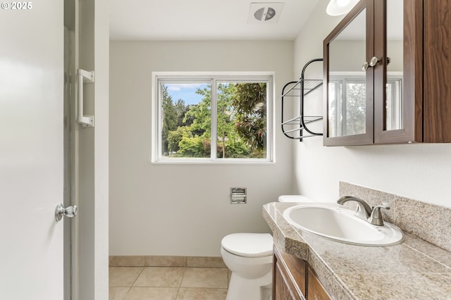 12370 SW 121st Ave, Tigard, OR 97223 - bathroom with vanity, tile patterned flooring, and toilet