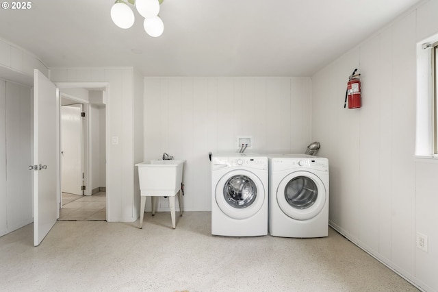 12370 SW 121st Ave, Tigard, OR 97223 - laundry area featuring washer and clothes dryer