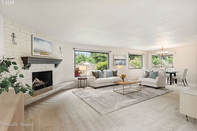 12370 SW 121st Ave, Tigard, OR 97223 - carpeted living room with a chandelier and a fireplace